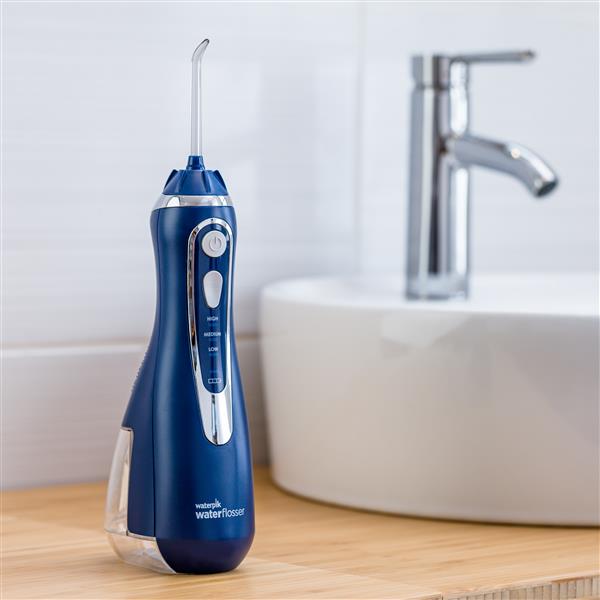 blue-cordless-advanced-water-flosser-wp-583-in-bathroom.jpg