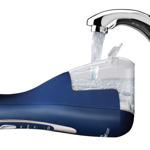 filling-water-reservoir-cordless-advanced-water-flosser-wp-583.jpg