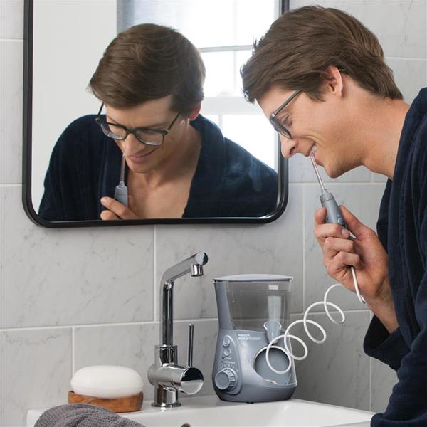 using-aquarius-water-flosser-wp-667-gray.jpg